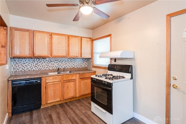 kitchen featuring range with gas cooktop, black dishwasher, backsplash, a sink, and extractor fan