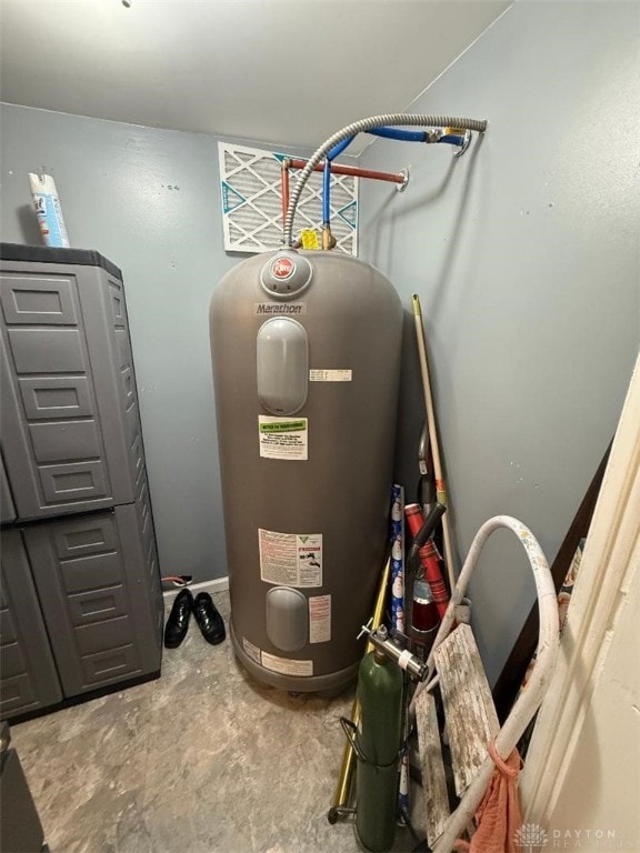 utility room with water heater