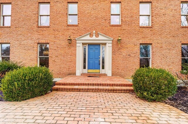 6485 Munger Rd, Dayton, OH 45459 - entrance to property with brick siding