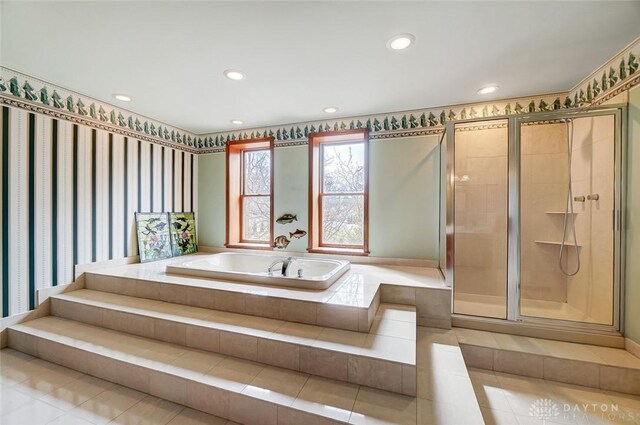 6485 Munger Rd, Dayton, OH 45459 - bathroom with tile patterned flooring, a shower stall, a bath, and recessed lighting