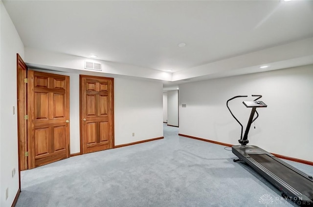 exercise area with recessed lighting, light carpet, visible vents, and baseboards