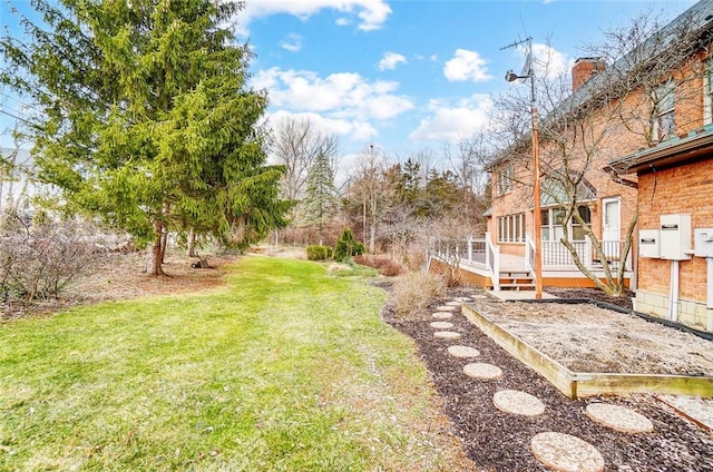 view of yard with a deck