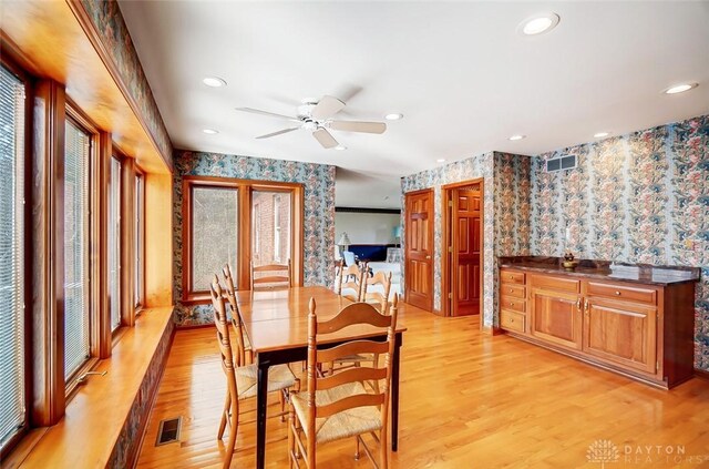 6485 Munger Rd, Dayton, OH 45459 - dining space with wallpapered walls, visible vents, light wood finished floors, and recessed lighting