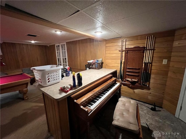 misc room featuring wood walls, carpet, billiards, and visible vents