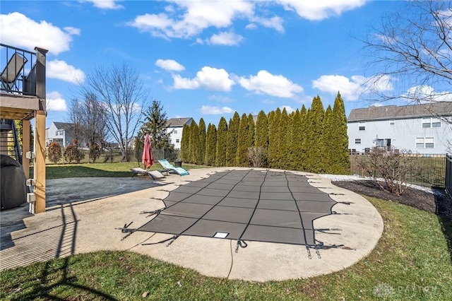 view of pool featuring a fenced backyard and a patio