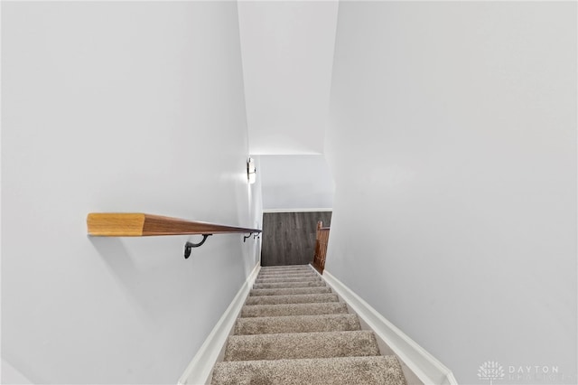 staircase with baseboards