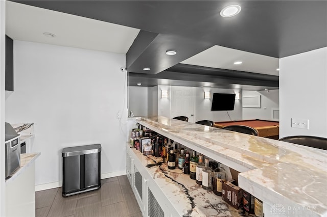 kitchen with recessed lighting and baseboards