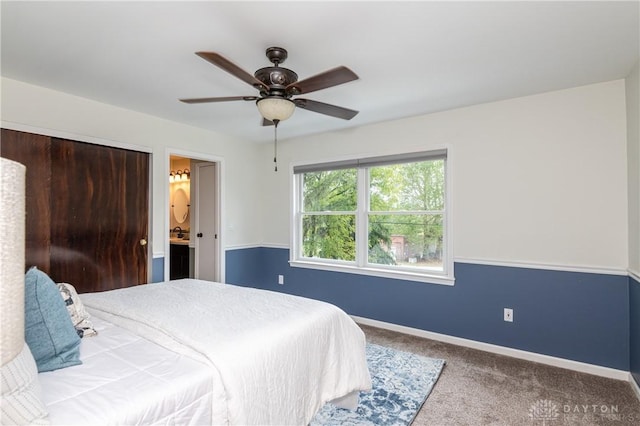 bedroom with carpet floors, baseboards, and a ceiling fan