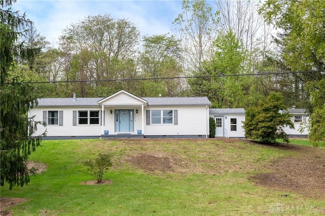 ranch-style home featuring a front yard and crawl space