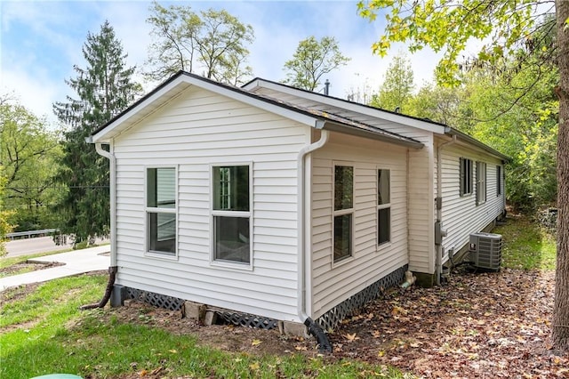 view of home's exterior with central air condition unit