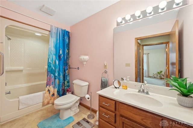 bathroom featuring vanity, toilet, and shower / bath combo with shower curtain