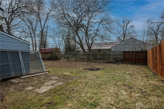 view of yard with a fenced backyard