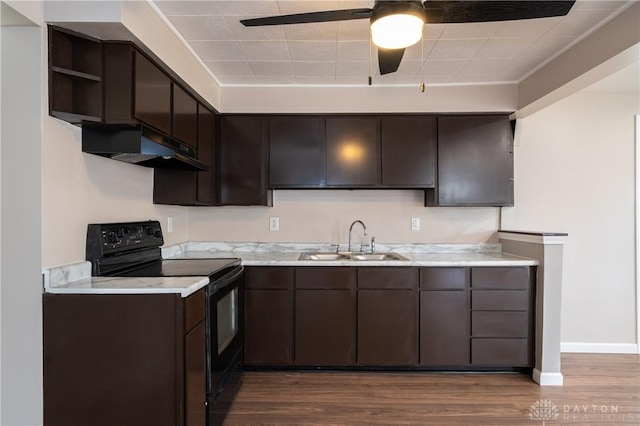 kitchen featuring black / electric stove, dark brown cabinets, under cabinet range hood, open shelves, and a sink