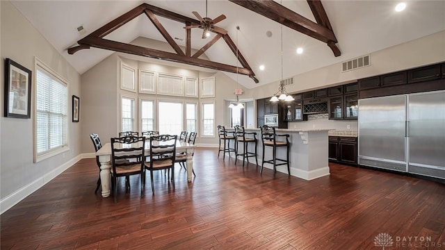 1226 Normandy Rue, Clearcreek Twp, OH 45458 - dining space featuring dark wood-style flooring, visible vents, beamed ceiling, and baseboards