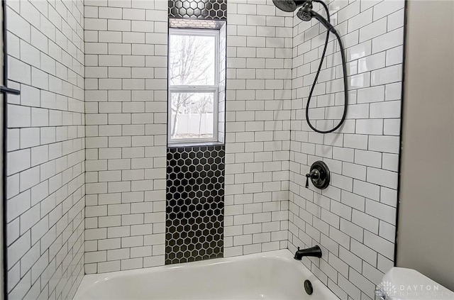 bathroom with shower / bath combination