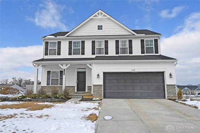 view of front of property with a garage, concrete driveway, a porch, and stone siding