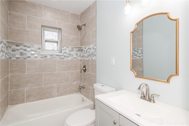 bathroom featuring  shower combination, vanity, and toilet