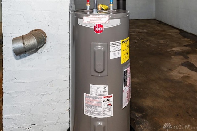 utility room with electric water heater