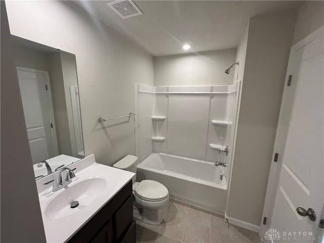 bathroom with visible vents, toilet, vanity, and shower / tub combination