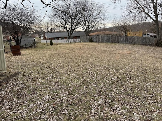 view of yard with fence