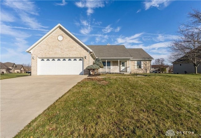 ranch-style house with a front lawn, an attached garage, brick siding, and driveway