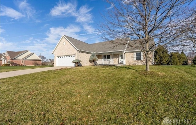 view of front facade featuring a garage, concrete driveway, and a front lawn