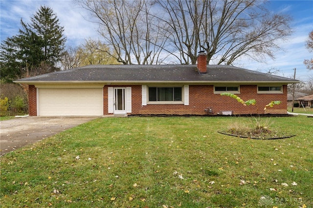 ranch-style house featuring a garage, driveway, brick siding, and a front lawn