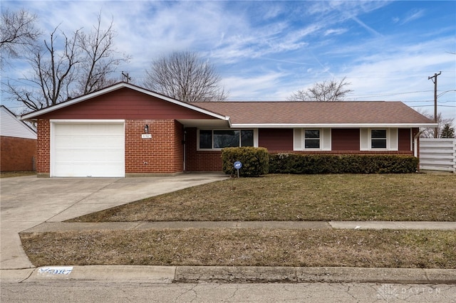 ranch-style house featuring brick siding, roof with shingles, an attached garage, driveway, and a front lawn