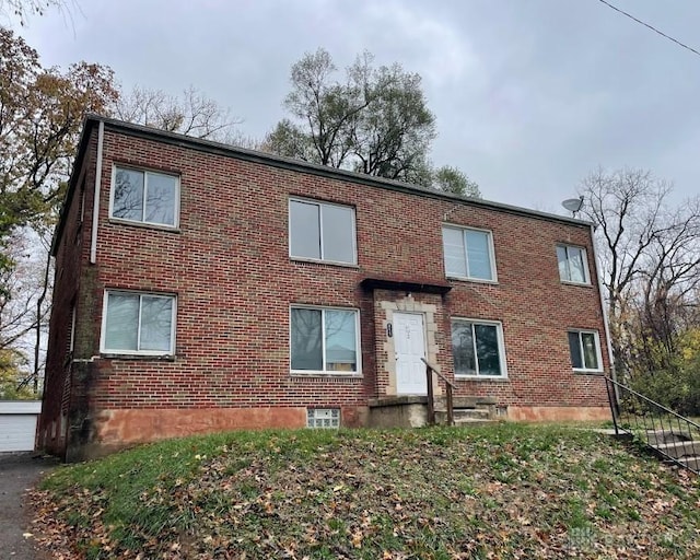 view of front of property with brick siding