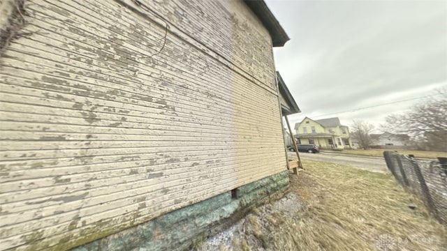 view of property exterior with brick siding