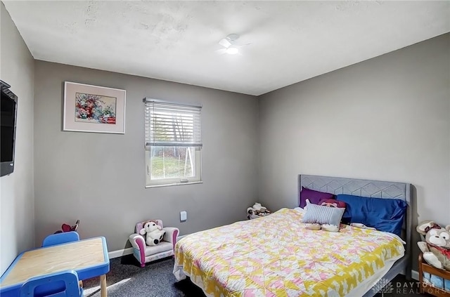 bedroom featuring baseboards and carpet flooring