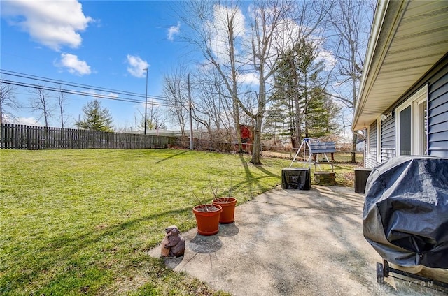 view of yard with a patio area and a fenced backyard