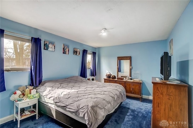 bedroom featuring baseboards