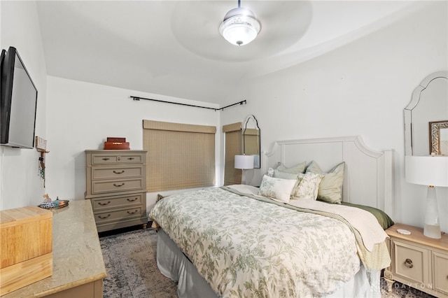 bedroom with lofted ceiling and ceiling fan