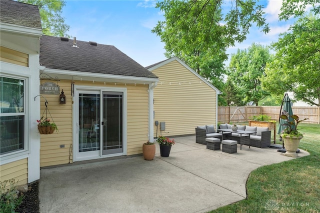 view of patio / terrace with fence and an outdoor living space