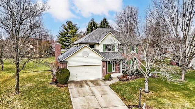 traditional home featuring driveway, an attached garage, a front yard, and brick siding