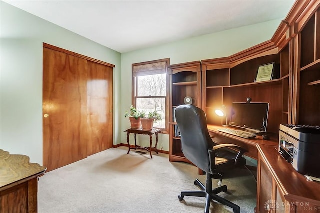 office area with baseboards and carpet flooring