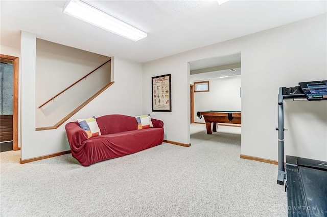 carpeted living area with stairway, billiards, and baseboards