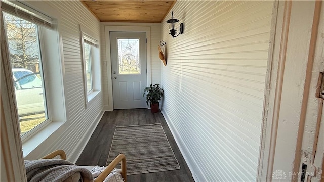 interior space with wood ceiling and dark wood-style flooring