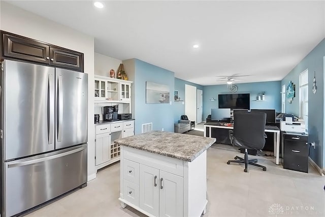 office space with a ceiling fan, recessed lighting, and visible vents