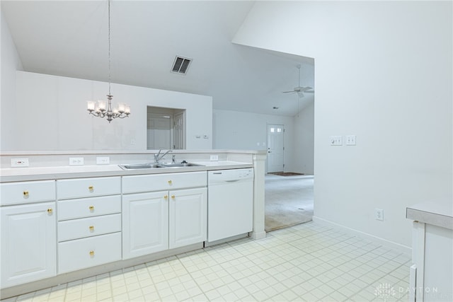 kitchen featuring visible vents, white dishwasher, light countertops, a sink, and ceiling fan with notable chandelier