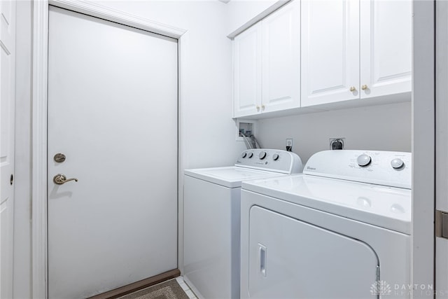 laundry area featuring cabinet space and washer and dryer