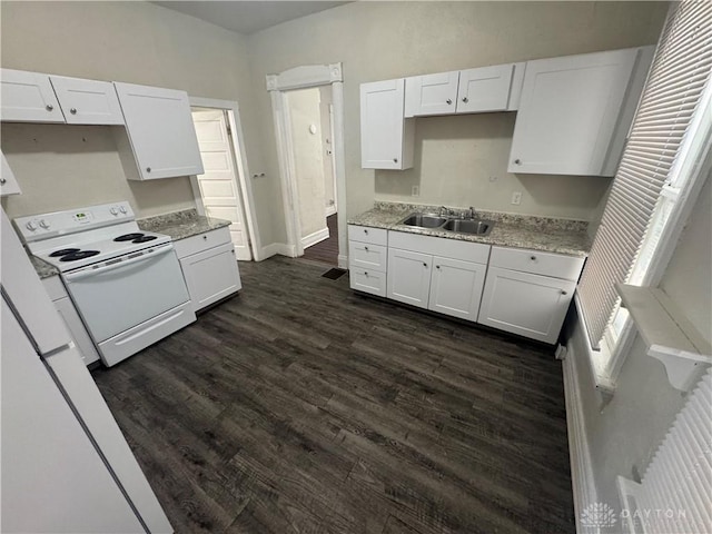 kitchen featuring white electric stove, a sink, dark wood finished floors, and white cabinets