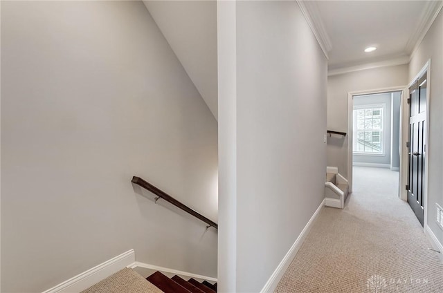 121 Lowe Ln, Dayton, OH 45402 - hall with baseboards, crown molding, and an upstairs landing