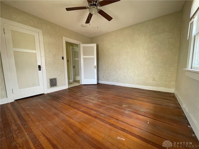 50 Woodcrest Ave, Dayton, OH 45405 - interior space featuring baseboards, visible vents, a ceiling fan, and hardwood / wood-style flooring