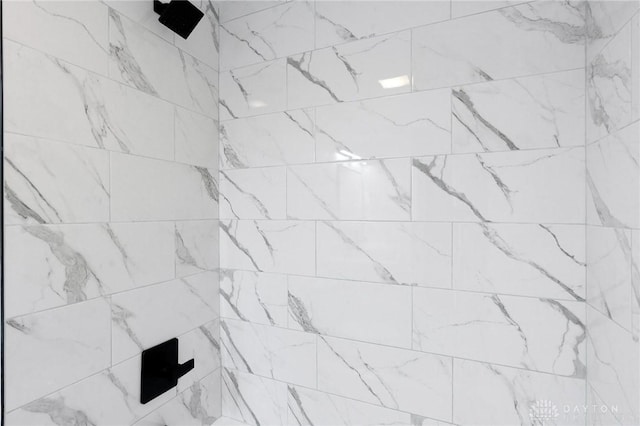 details featuring a tile shower