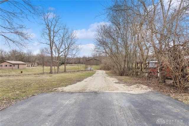 view of street featuring driveway