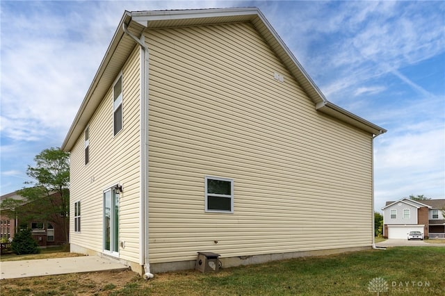 view of home's exterior with a patio area