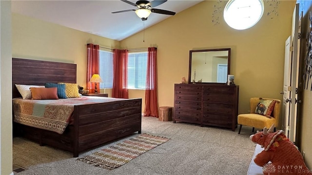 bedroom with vaulted ceiling, carpet floors, and ceiling fan