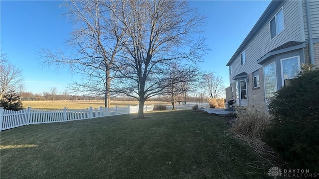 view of yard featuring fence